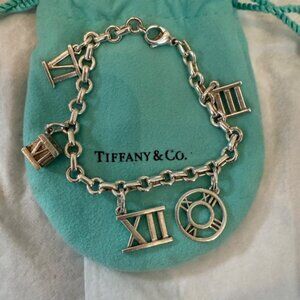 Tiffany sterling silver Atlas charm bracelet with donut chain bracelet 5 charms